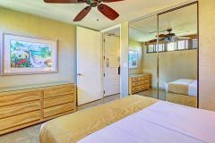 Bedroom with glass door closet